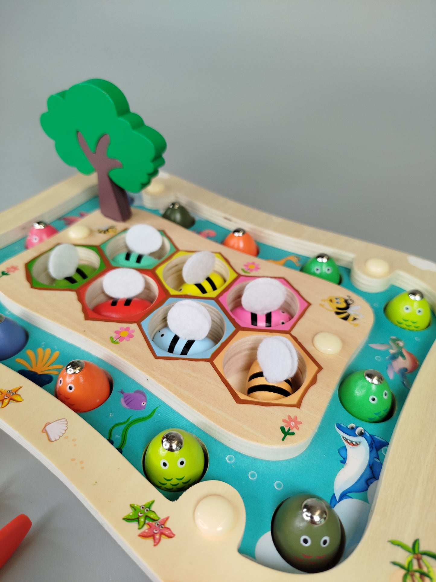 Uping Holzspielzeug-Set - Bienen und Fische