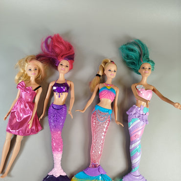 Mattel Barbie Modepuppen Set – 4 Puppen mit Meerjungfrauen-Themen