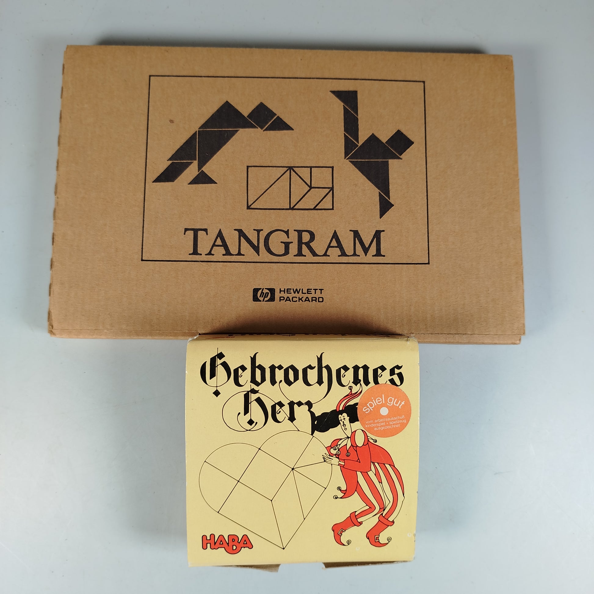 Hewlett Packard & HABA Puzzle-Bundle: Tangram & Gebrochenes Herz