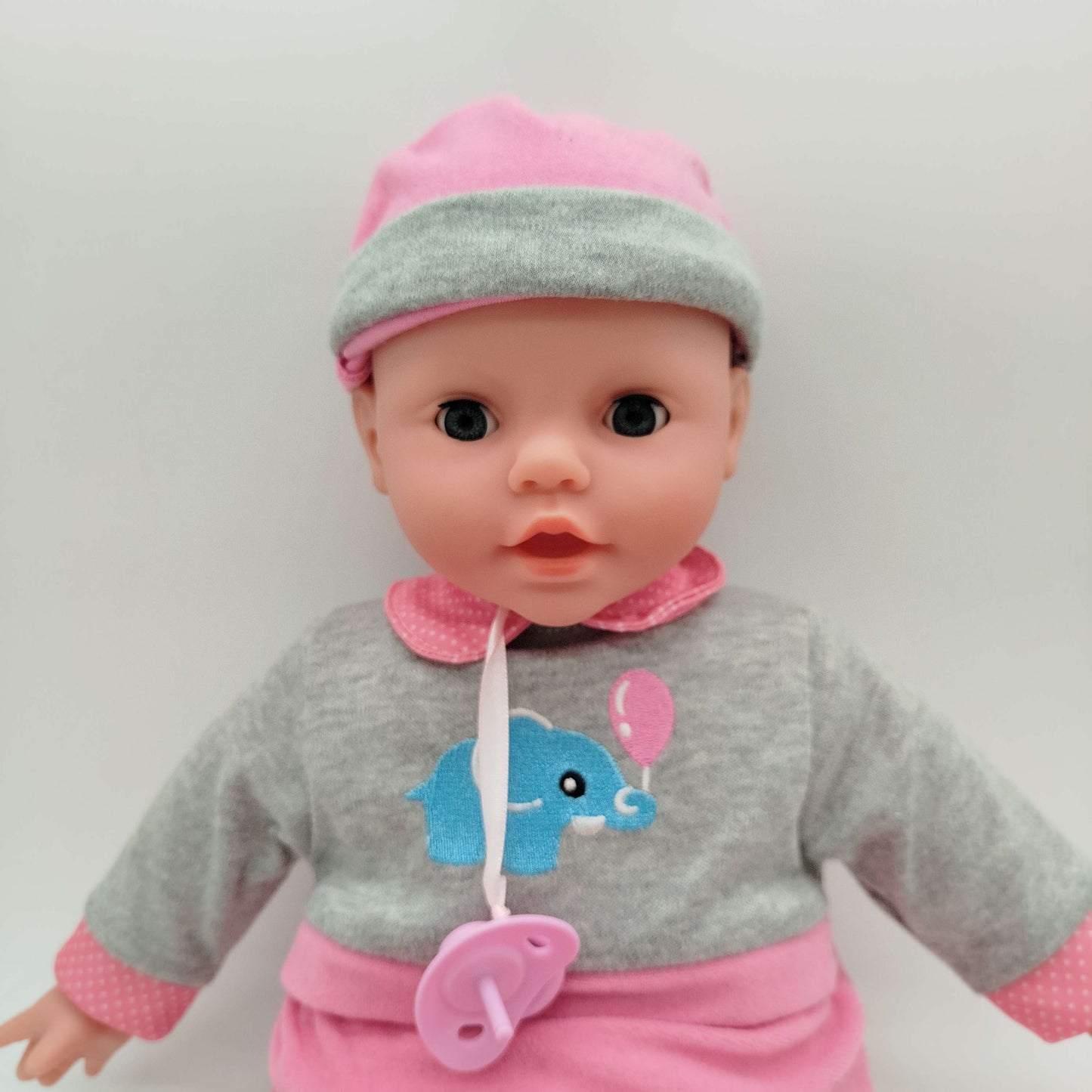 Babypuppe mit Schnuller & Overall
