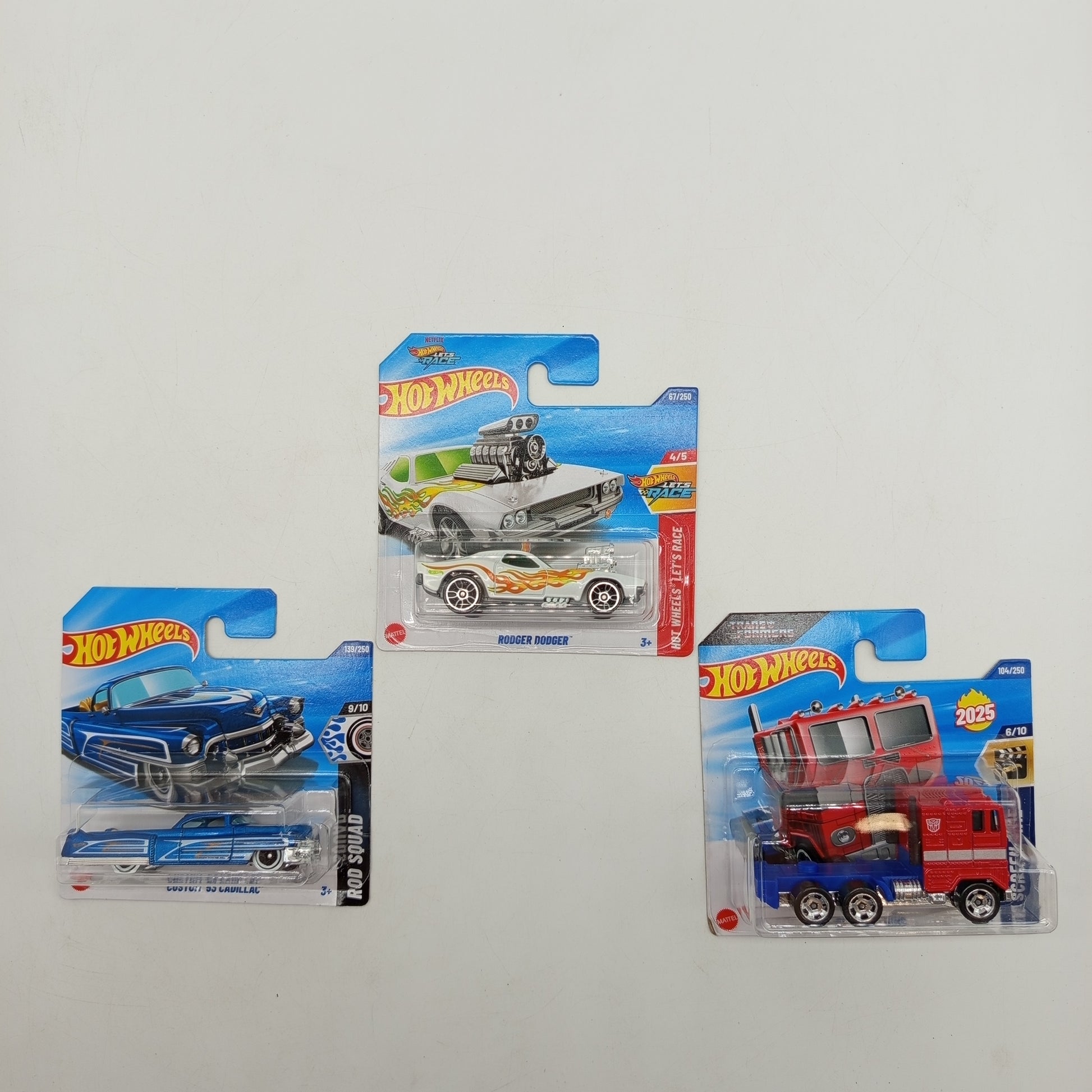 Hot Wheels 3er Set 2025 – Rodger Dodger, Optimus Prime & '52 Cadillac, OVP, neu