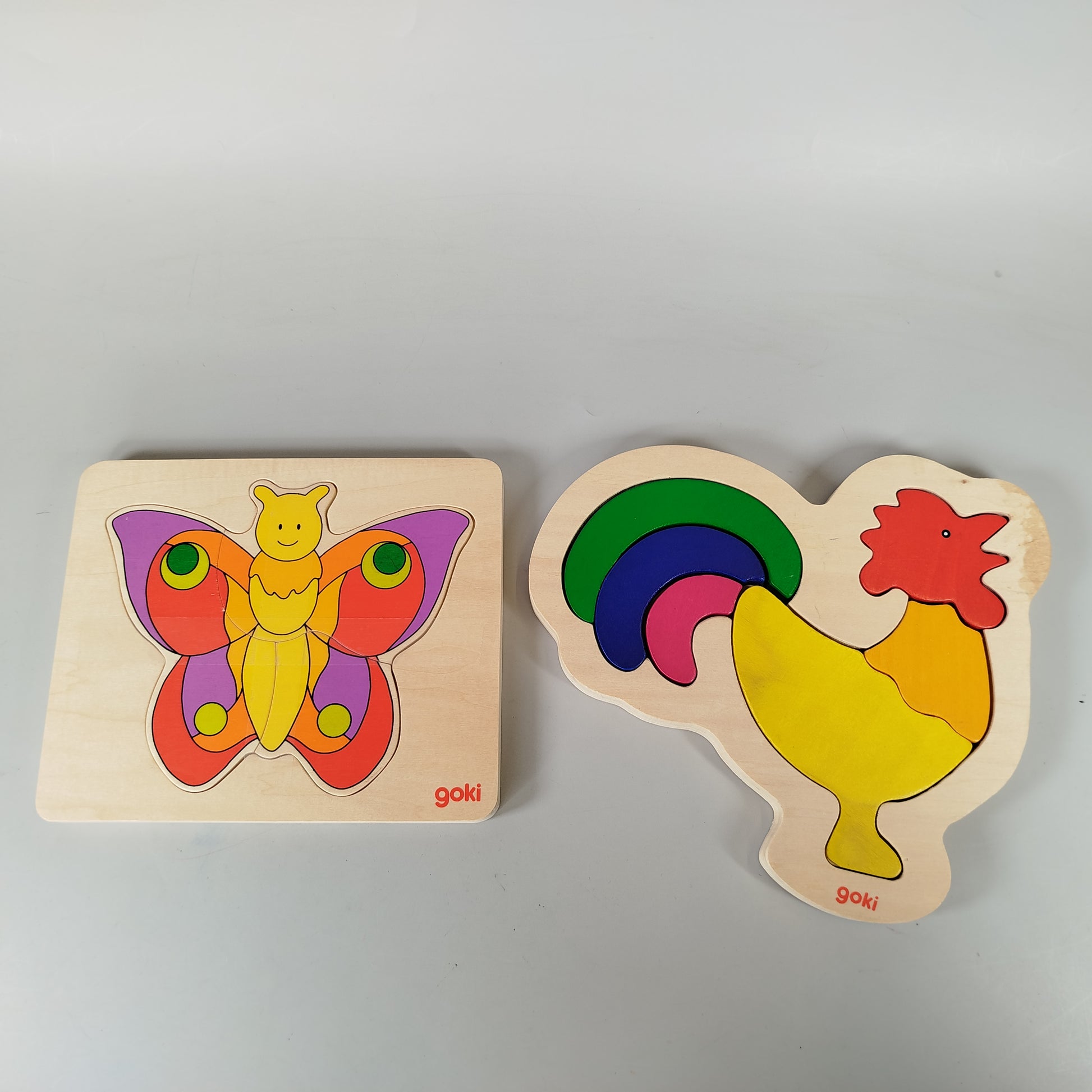 Goki Holzpuzzle-Bundle: Schmetterling & Hahn