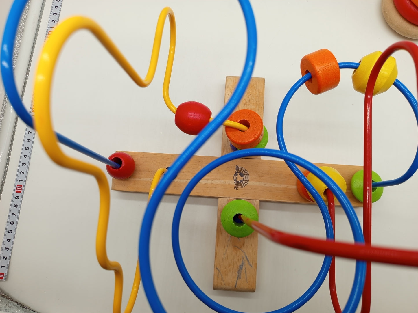 Motorikspielzeug Set aus Holz – Motorikschleife & Stapelringe