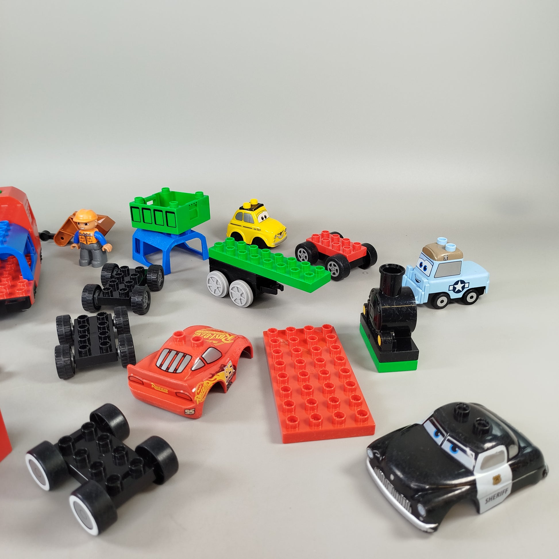 LEGO DUPLO Konvolut ca. 3,3 kg – Fahrzeuge, Züge & Figuren gemischt
