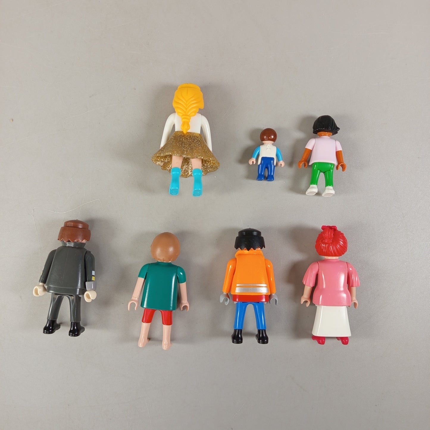 Playmobil Figuren Set von 7 mit Zubehör – Cowboy, Feuerwehr, Freizeitfiguren