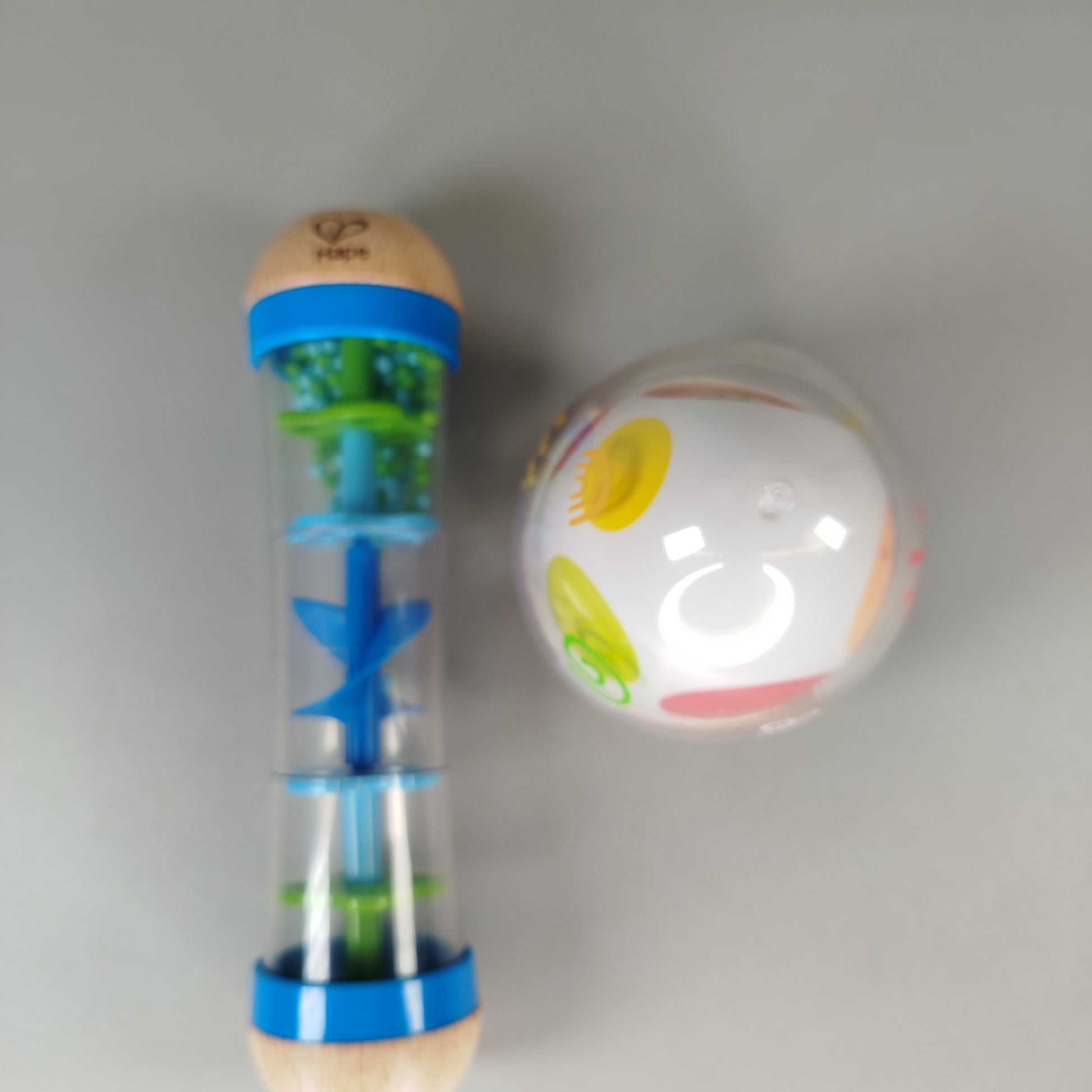 Hape Sensorikspielzeug Set – Rassel & Eierspielzeug, guter Zustand