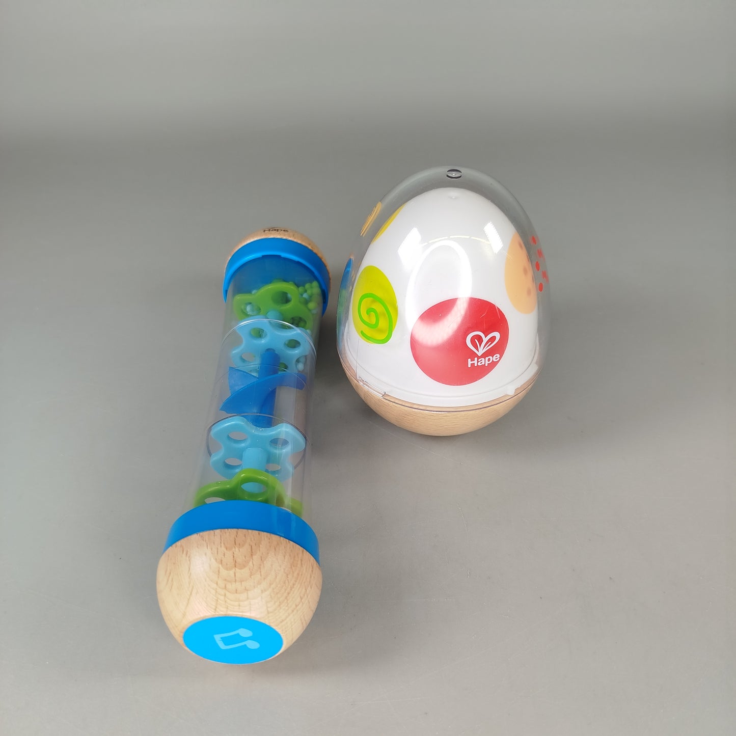 Hape Sensorikspielzeug Set – Rassel & Eierspielzeug, guter Zustand
