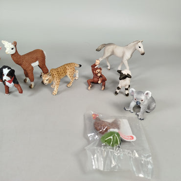 Schleich Tiere Set von 13 Figuren – Hund, Löwe, Pferdefohlen, Koala