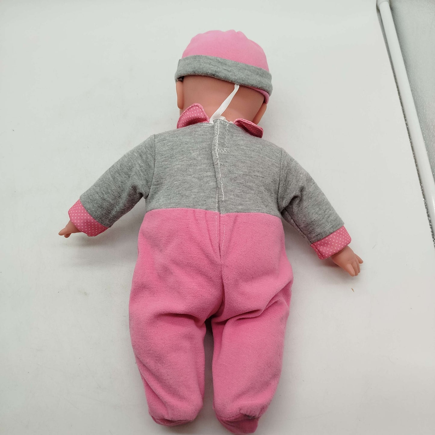 Babypuppe mit Schnuller & Overall