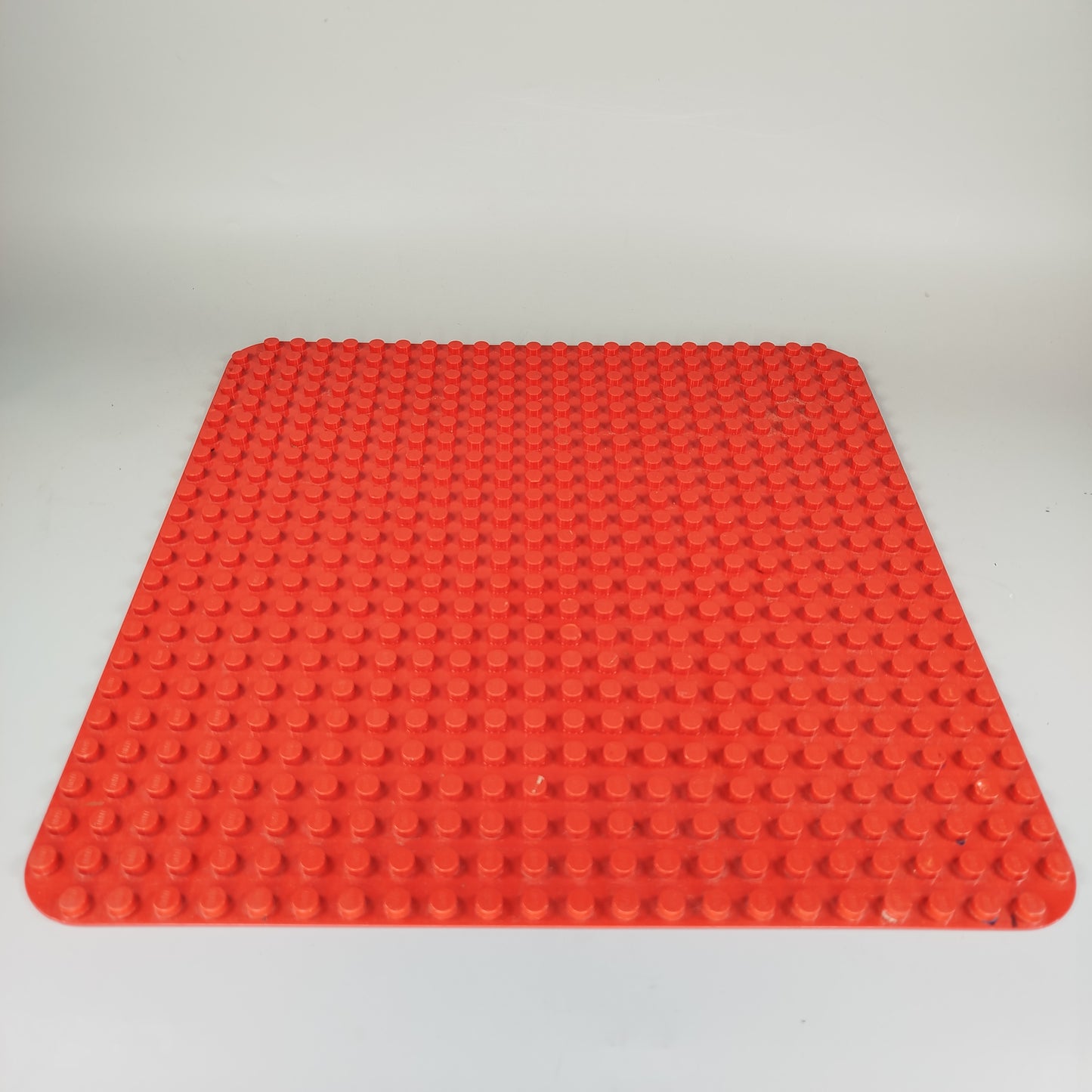 Lego Duplo Konvolut - 7,5 kg gemischte Steine und rote Bauplatte