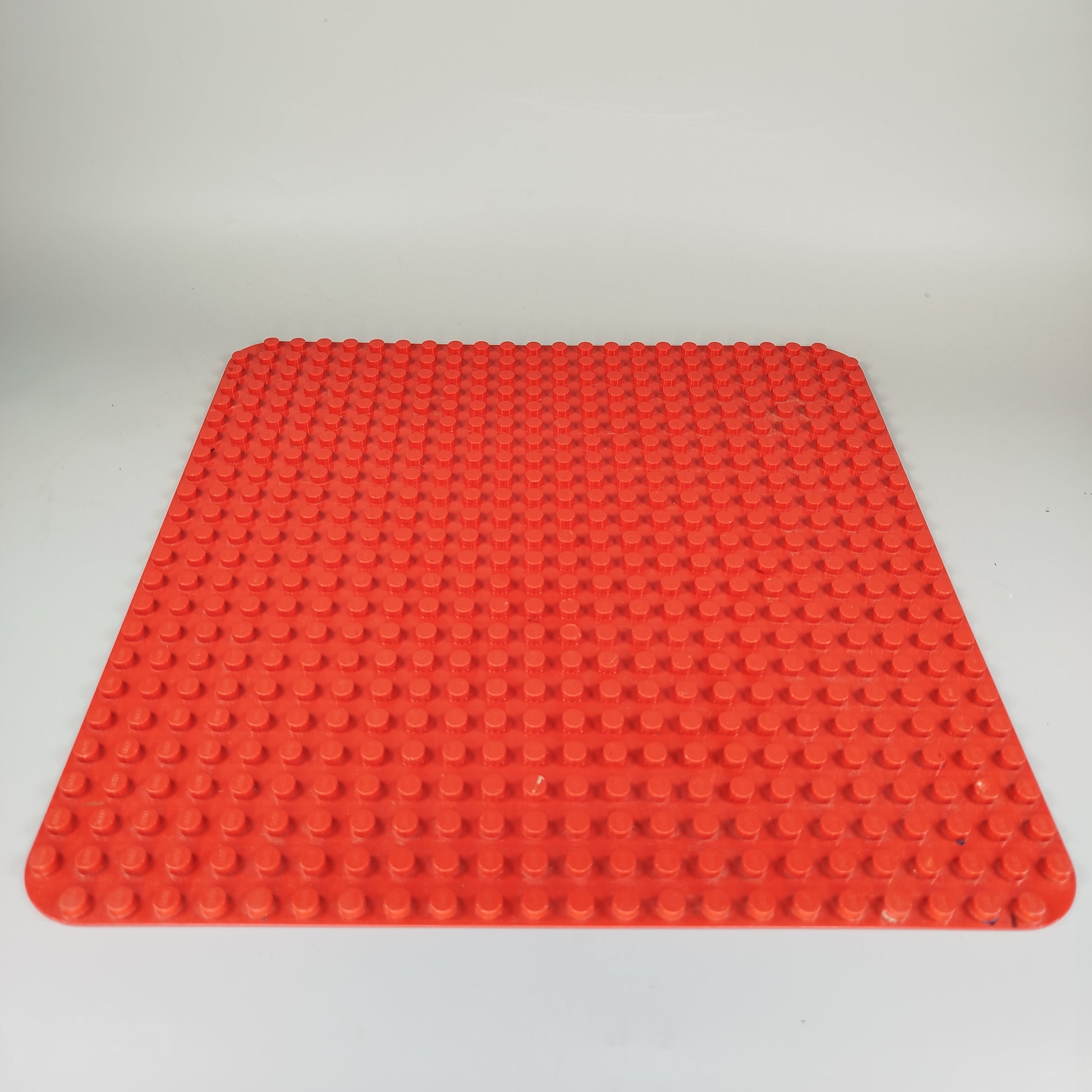Lego Duplo Konvolut - 7,5 kg gemischte Steine und rote Bauplatte