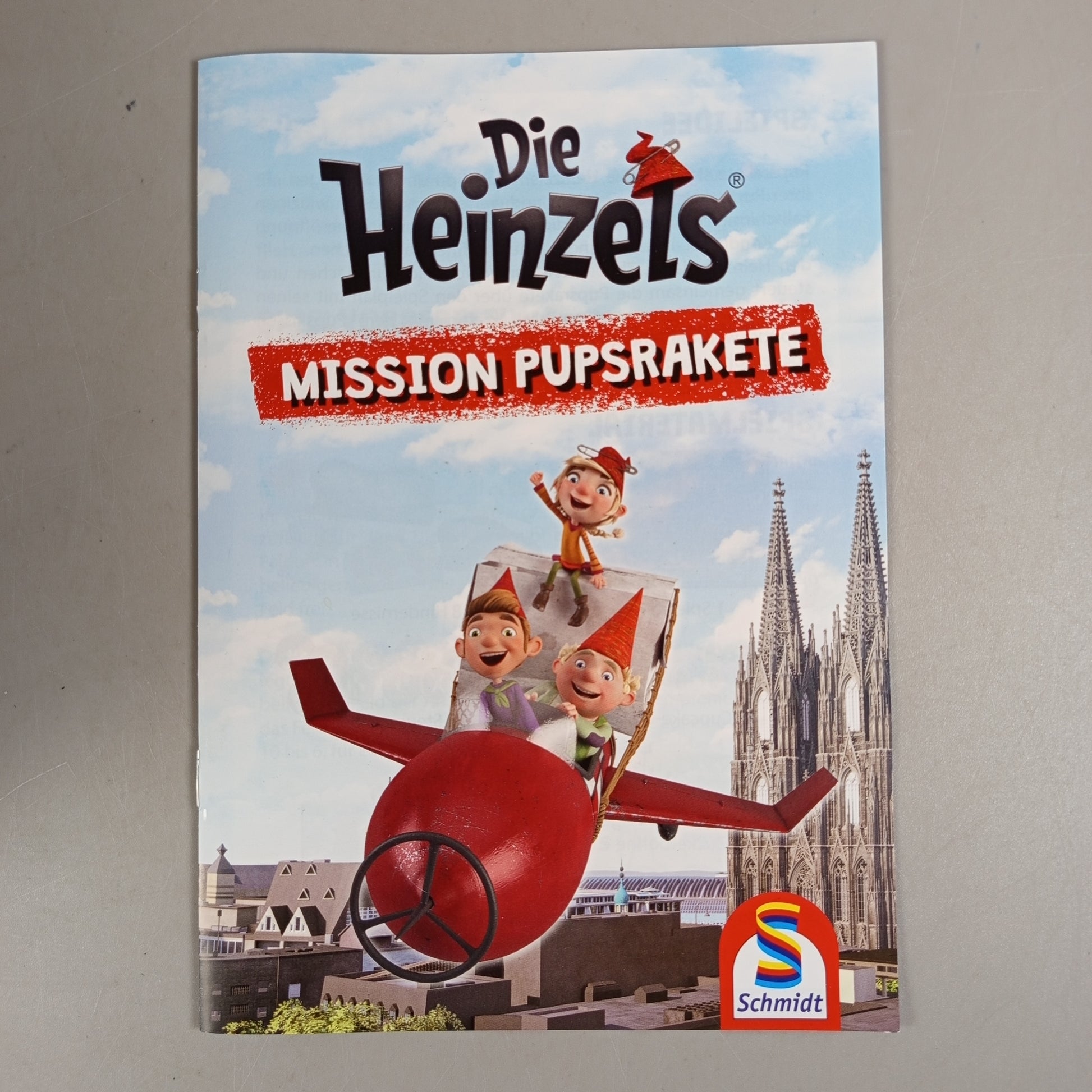 Schmidt Spiele Brettspiel – Die Heinzels: Mission Pupsrakete, OVP