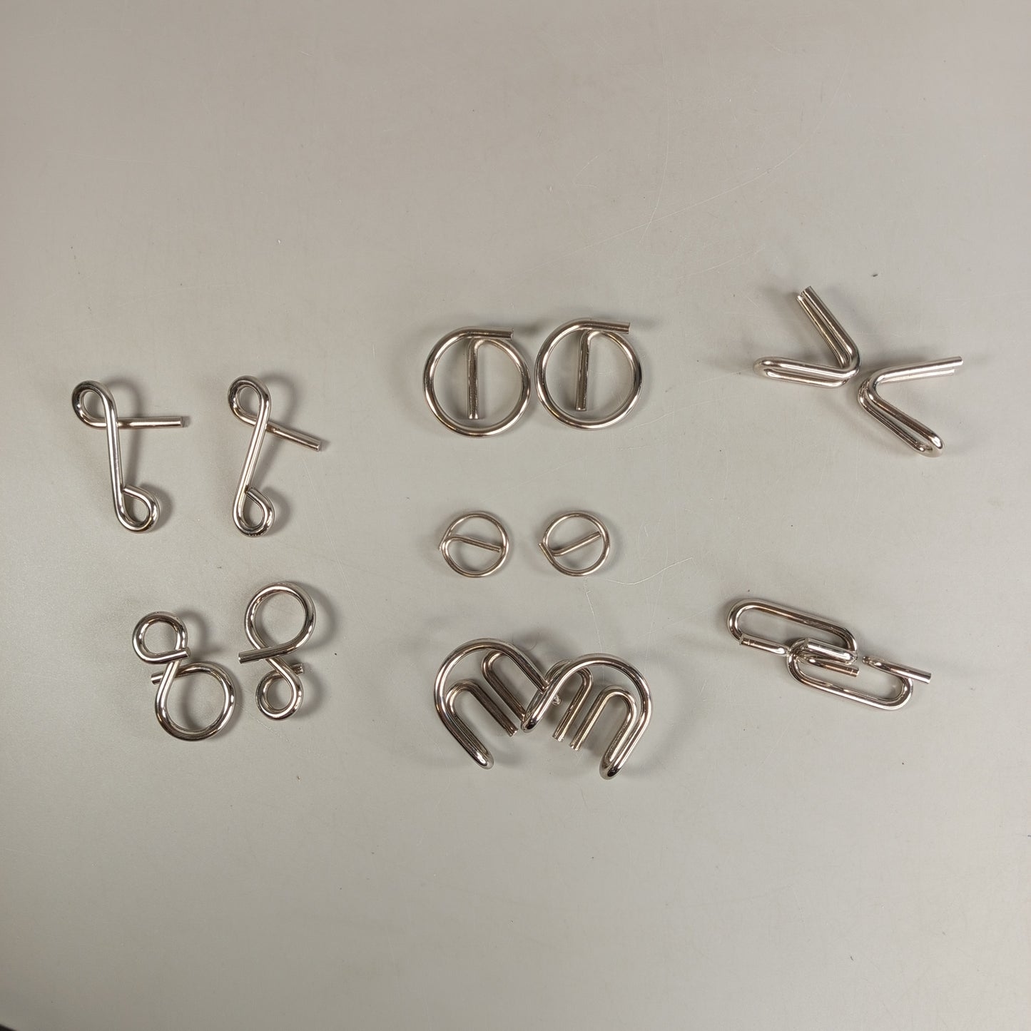 Djeco Crazix Puzzle-Spiel – Set mit 8 Metallrätseln, OVP, neu