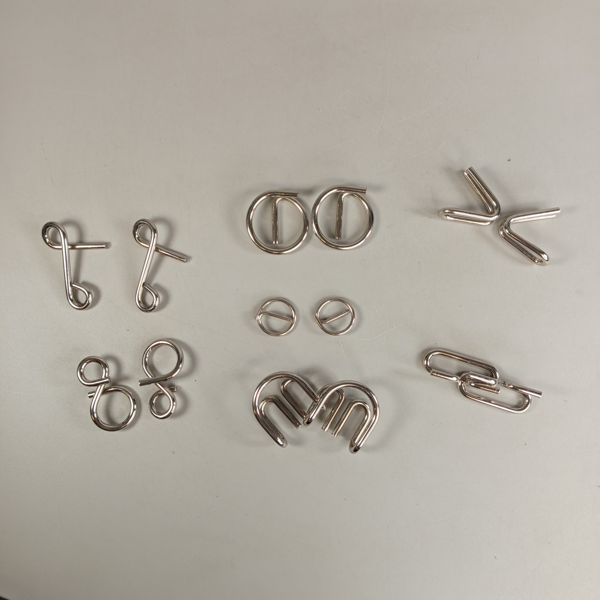 Djeco Crazix Puzzle-Spiel – Set mit 8 Metallrätseln, OVP, neu