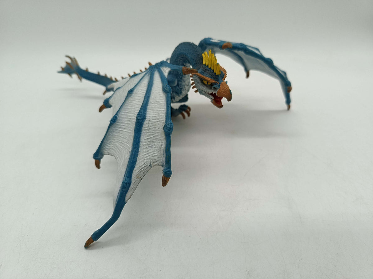Fantasy Drache Blau-Weiß Spielfigur mit gelbem Kamm