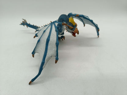 Fantasy Drache Blau-Weiß Spielfigur mit gelbem Kamm
