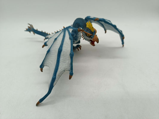 Fantasy Drache Blau-Weiß Spielfigur mit gelbem Kamm