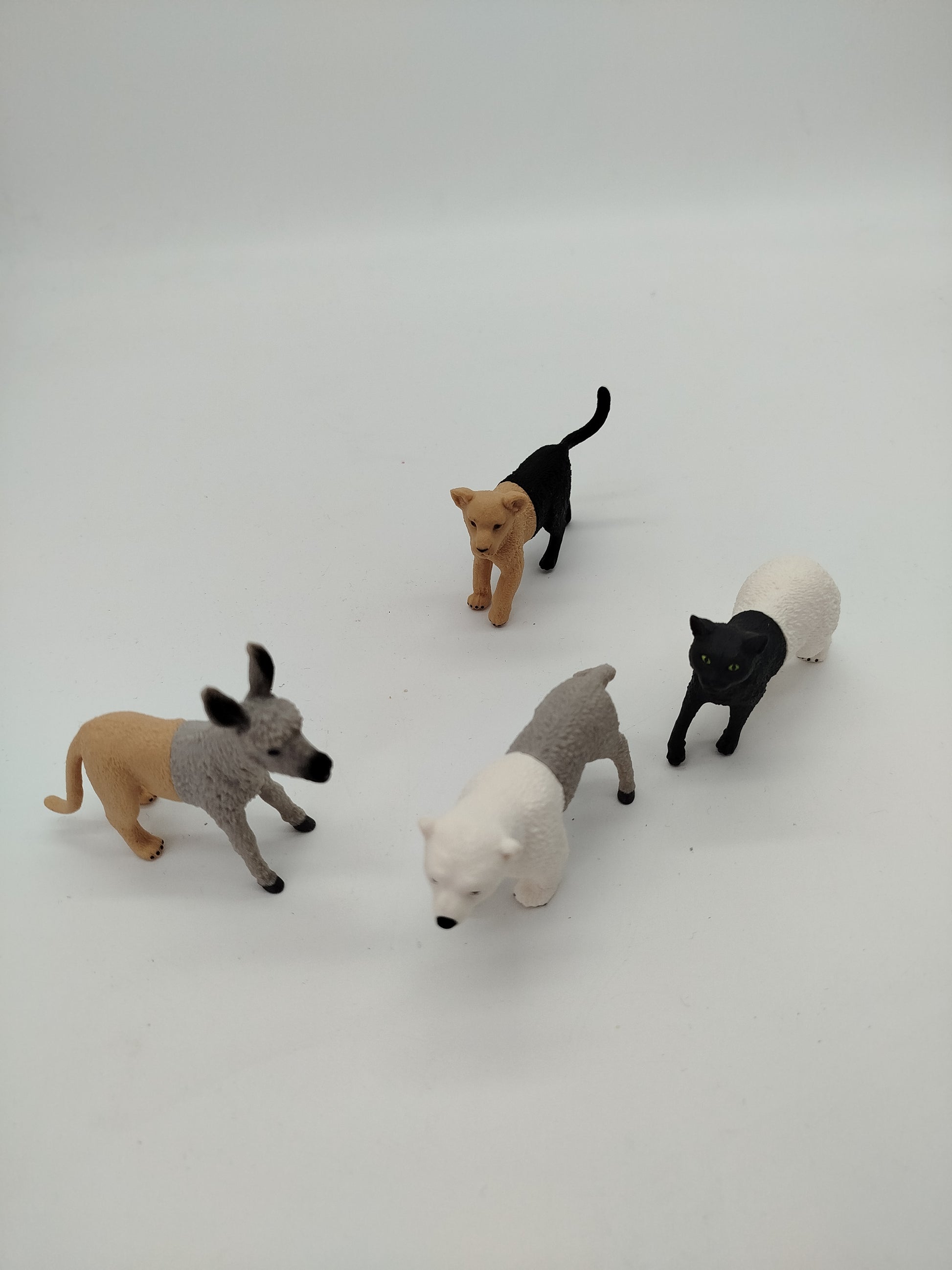 Schleich Puzzlemals Set von 4 – Eisbär, Katze, Esel, Löwenjunges